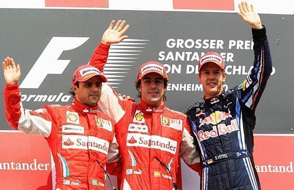 Glückliche Sieger in Hockenheim? Fernando Alonso vor Ferrari-Teamkollege Felipe Massa und Red Bull-Pilot Sebastian Vettel. Foto: RB/auto-reporter.net 